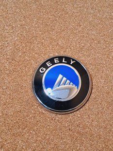Емблема передня решітки радіатора 12 см Geely FC Vision, Джилі ФС, Джилі ФС 1061000017.7 фото