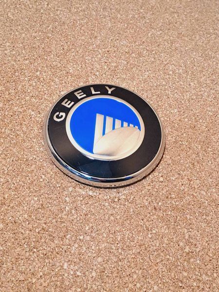 Емблема передня решітки радіатора 12 см Geely FC Vision, Джилі ФС, Джилі ФС 1061000017.7 фото